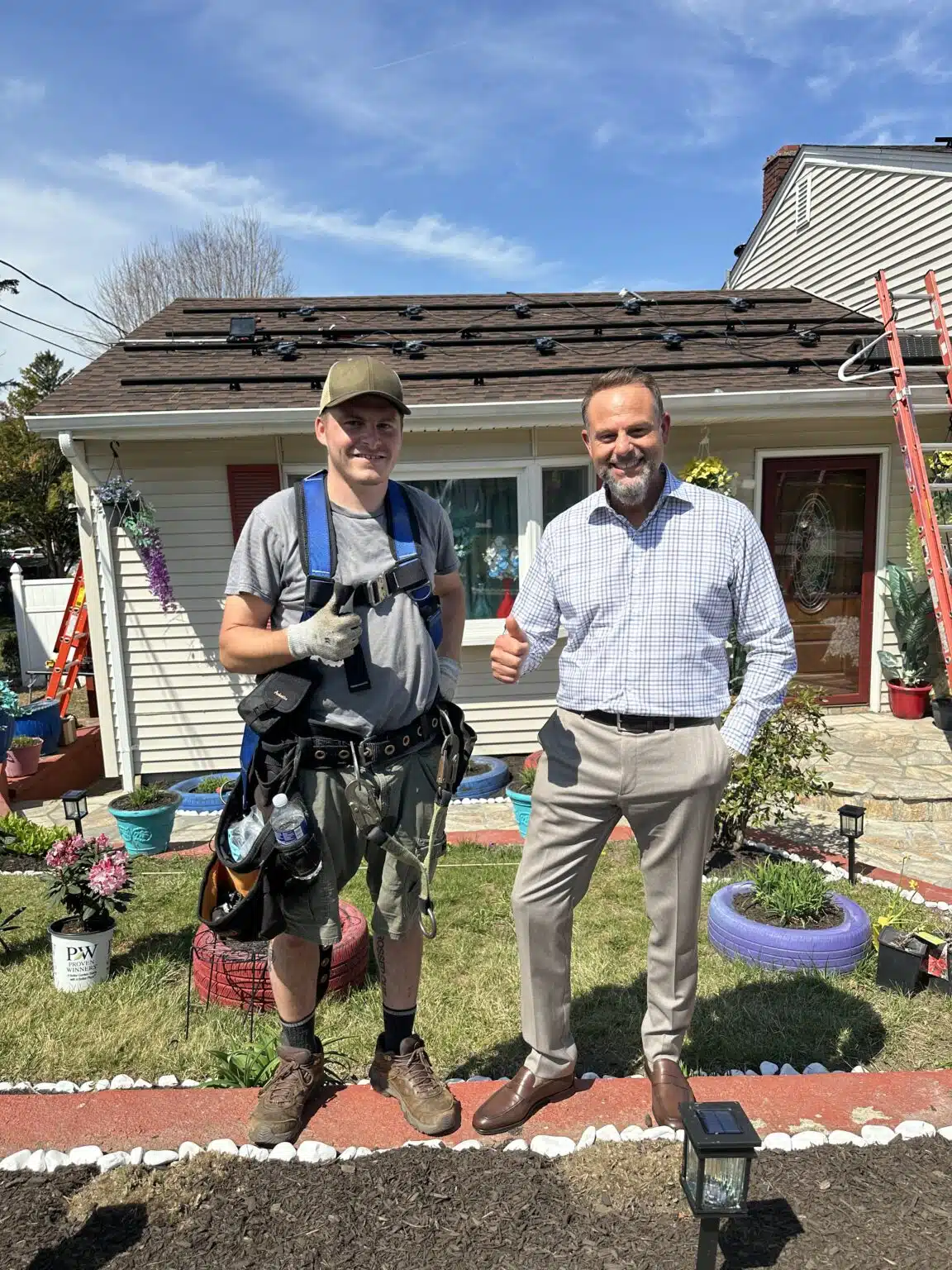 iSP CEO Bill Barrieau with installer at a Windham County solar install